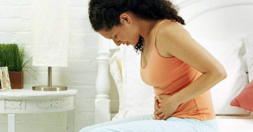 Болит живот после слабительного. Фото цистита беременной картинка.